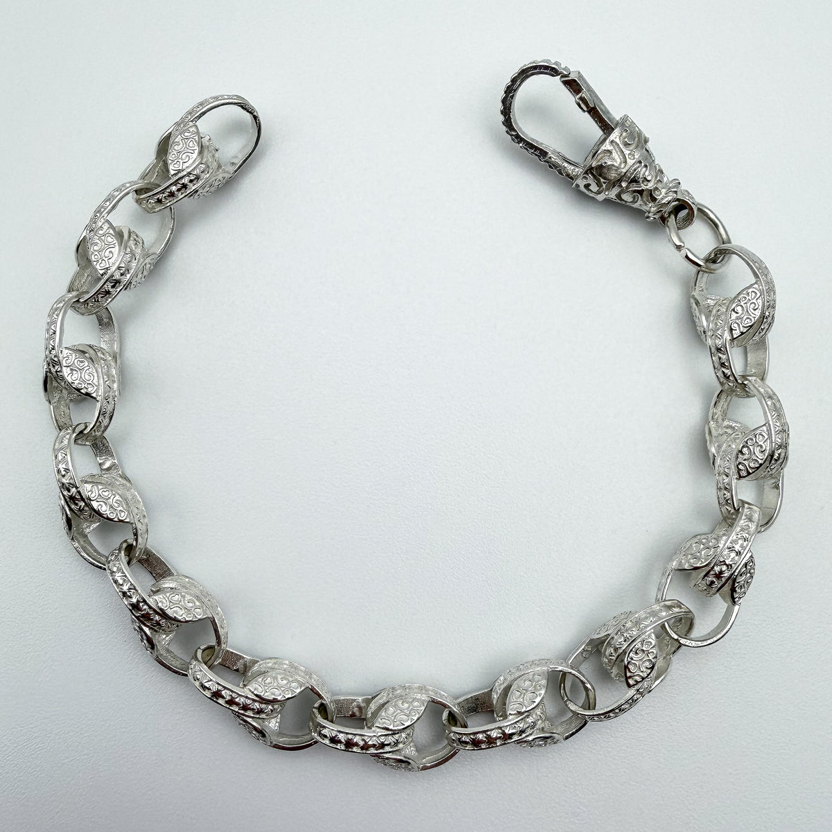 925 sterling silver Tulip link bracelet, 8 inches long, photographed on white background