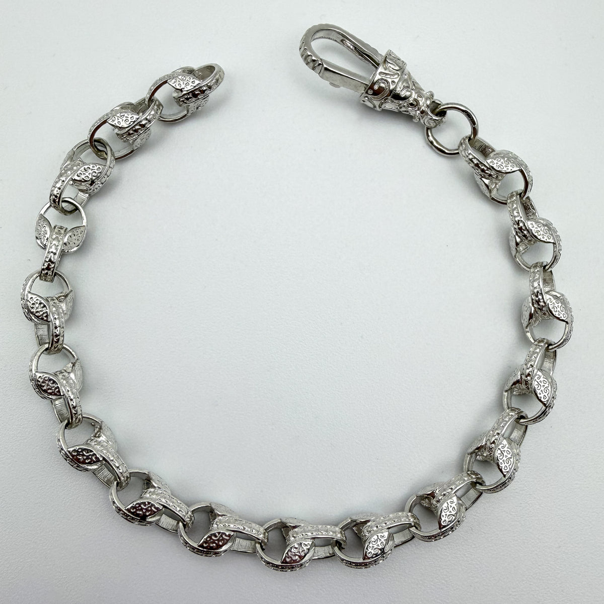 925 sterling silver Tulip link bracelet, 8.5 inches long, photographed on white background