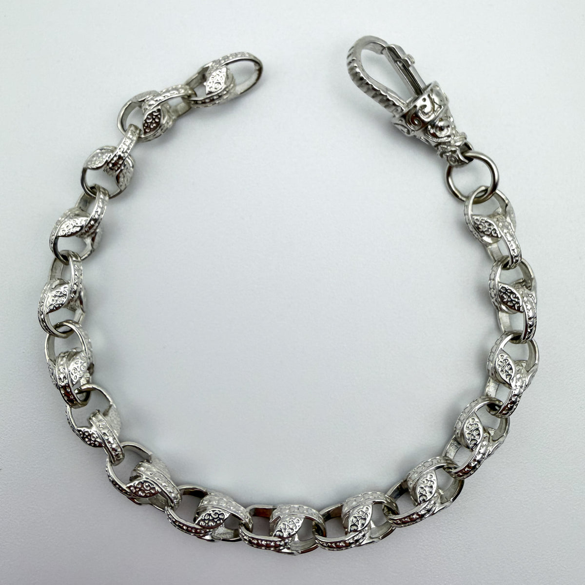 925 sterling silver Tulip link bracelet, 8.25 inches long, photographed on white background
