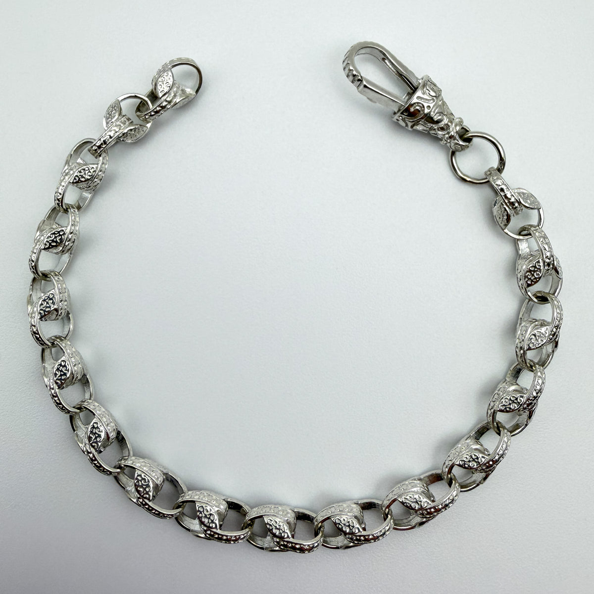 925 sterling silver Tulip link bracelet, 8.5 inches long, photographed on white background
