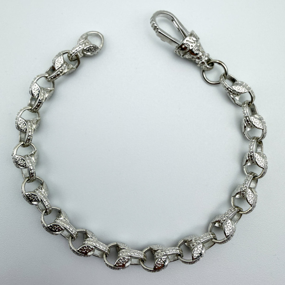 925 sterling silver Tulip link bracelet, 8.25 inches long, photographed on white background
