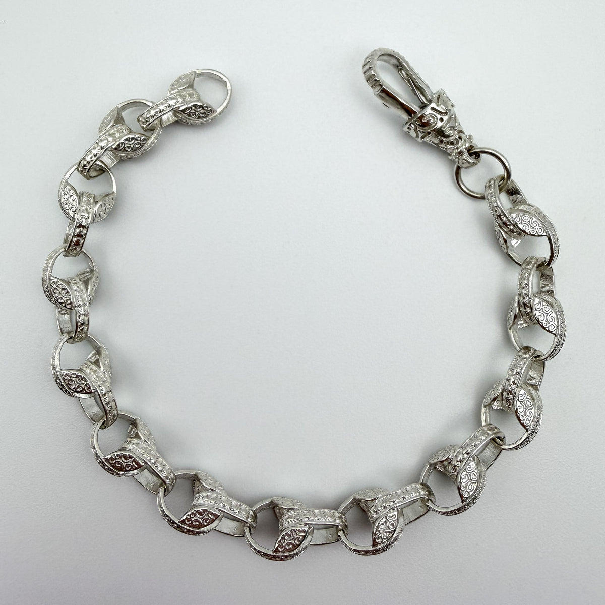 925 sterling silver Tulip link bracelet, 8.5 inches long, photographed on white background