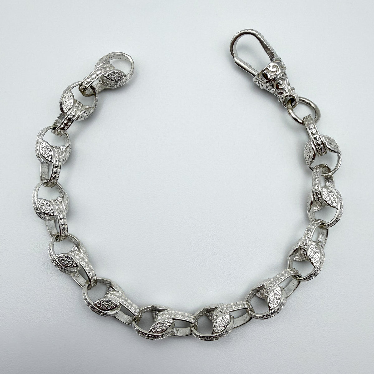 925 sterling silver Tulip link bracelet, 8.5 inches long, photographed on white background
