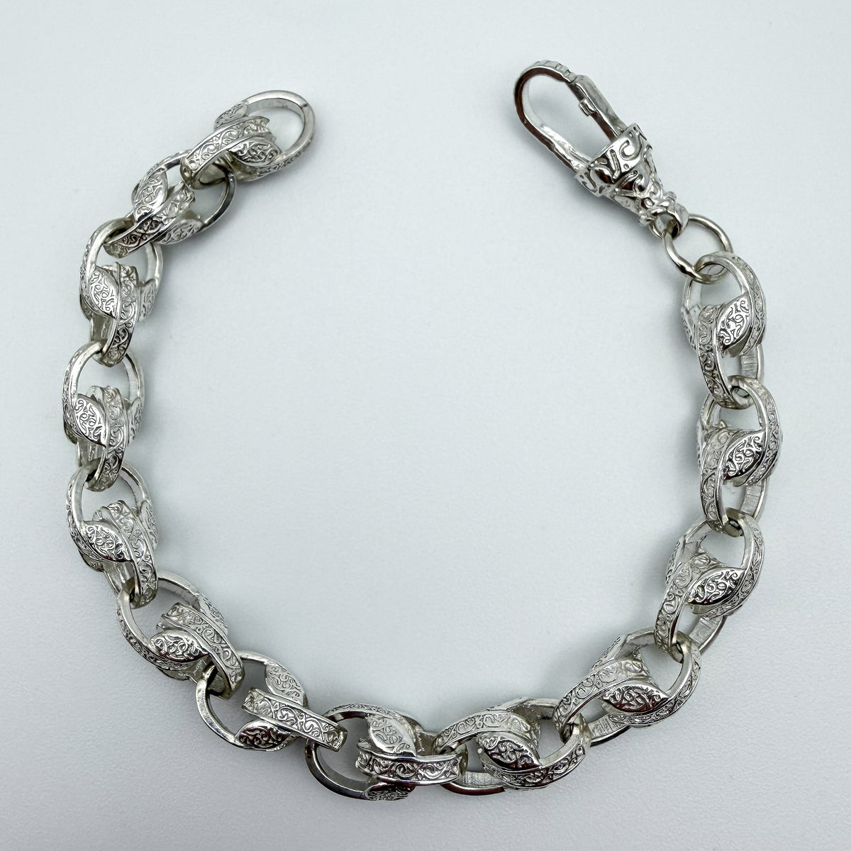 925 sterling silver Tulip link bracelet, 8 inches long, photographed on white background