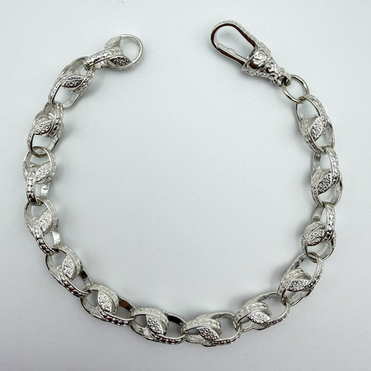 925 sterling silver Tulip link bracelet, 9.25 inches long, photographed on white background
