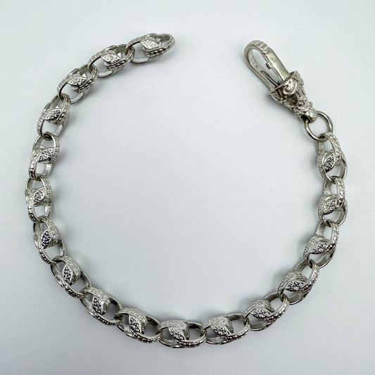925 sterling silver Tulip link bracelet, 8.5 inches long, photographed on white background