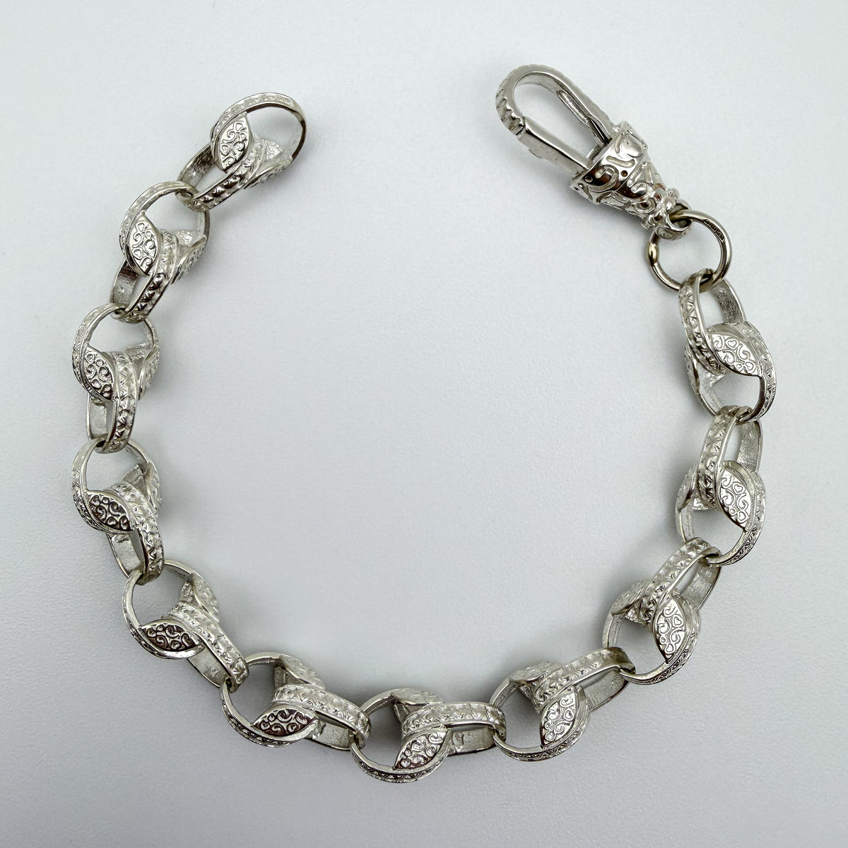 925 sterling silver Tulip link bracelet, 7.5 inches long, photographed on white background