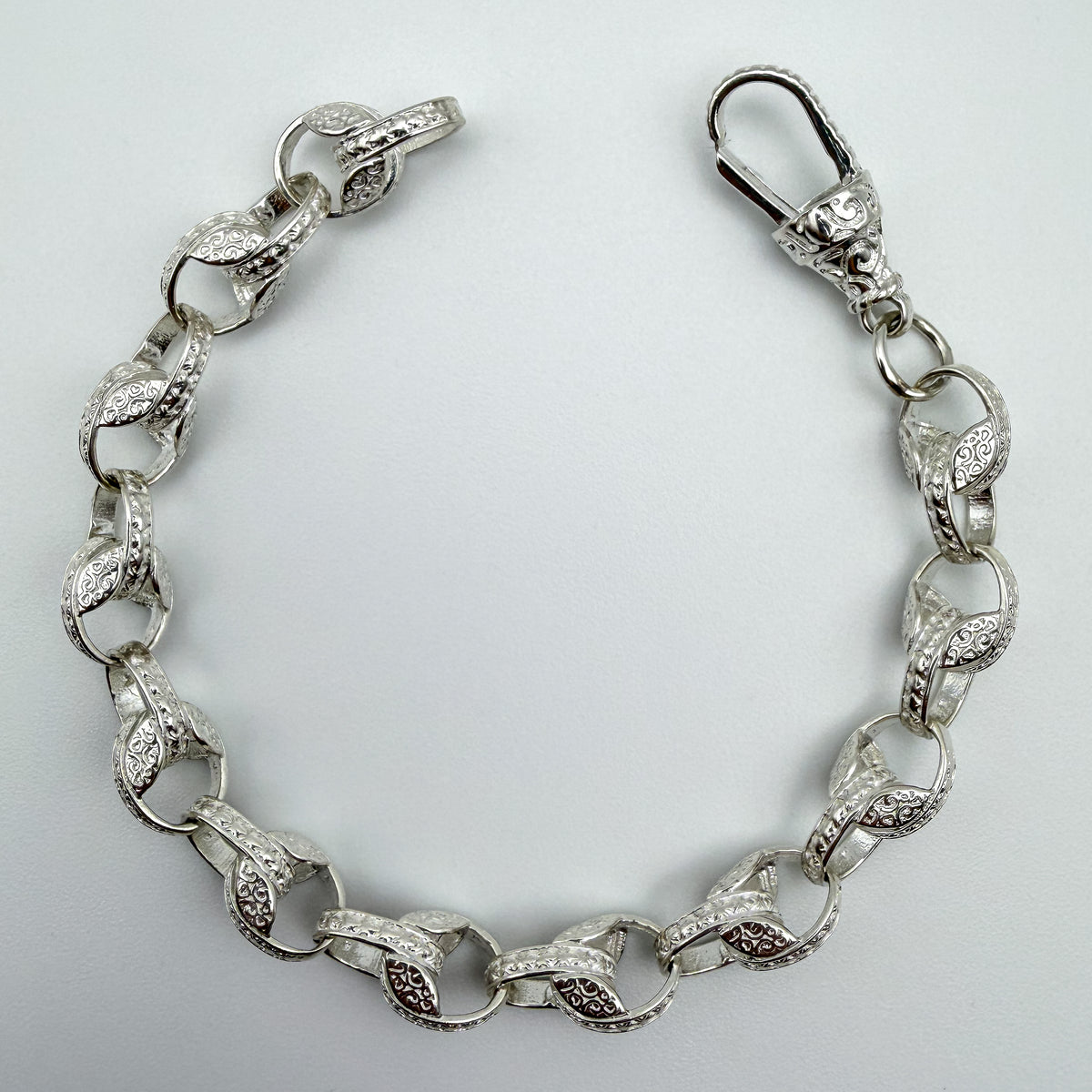 925 sterling silver Tulip link bracelet, 8 inches long, photographed on white background