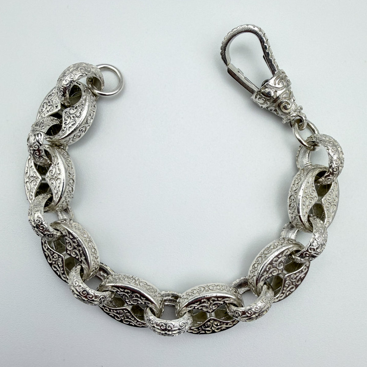 925 sterling silver Button & Belcher link bracelet, 7.5 inches long, photographed on white background