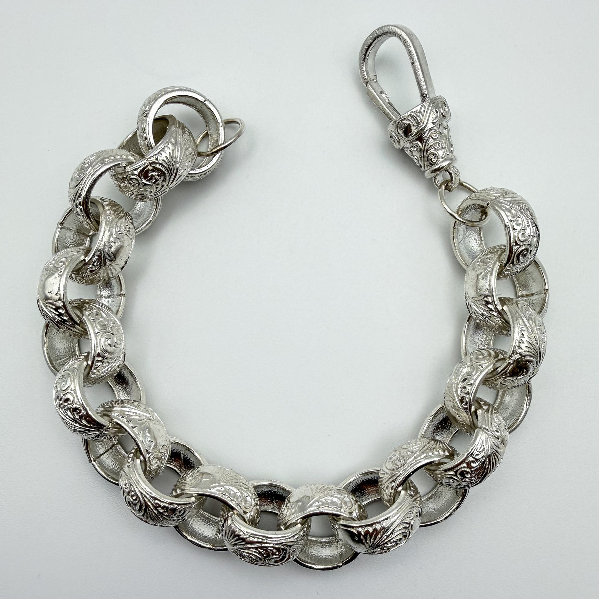 925 sterling silver Patterned Belcher link bracelet, 10 inches long, photographed on white background