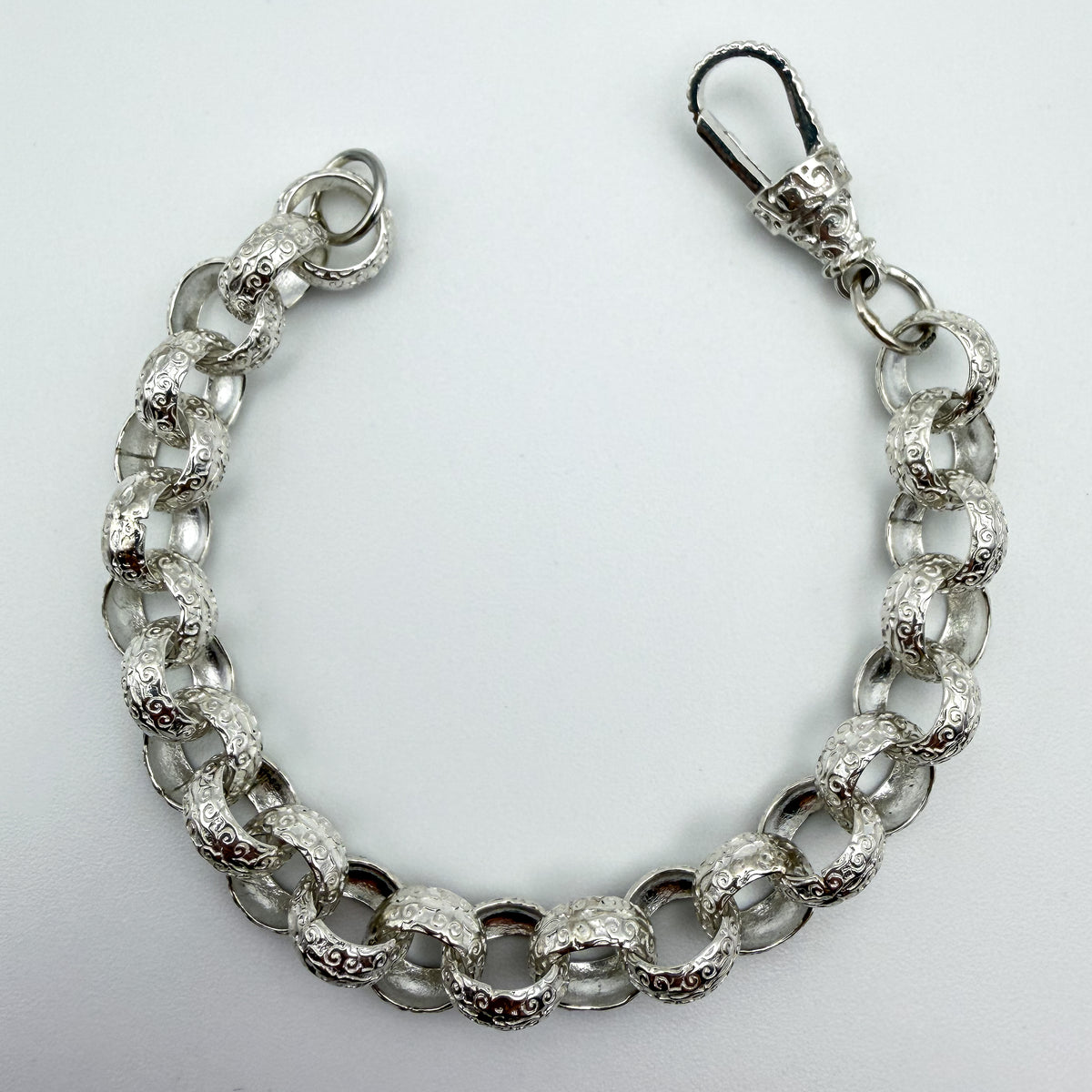 925 sterling silver Patterned Belcher link bracelet, 8.25 inches long, photographed on white background